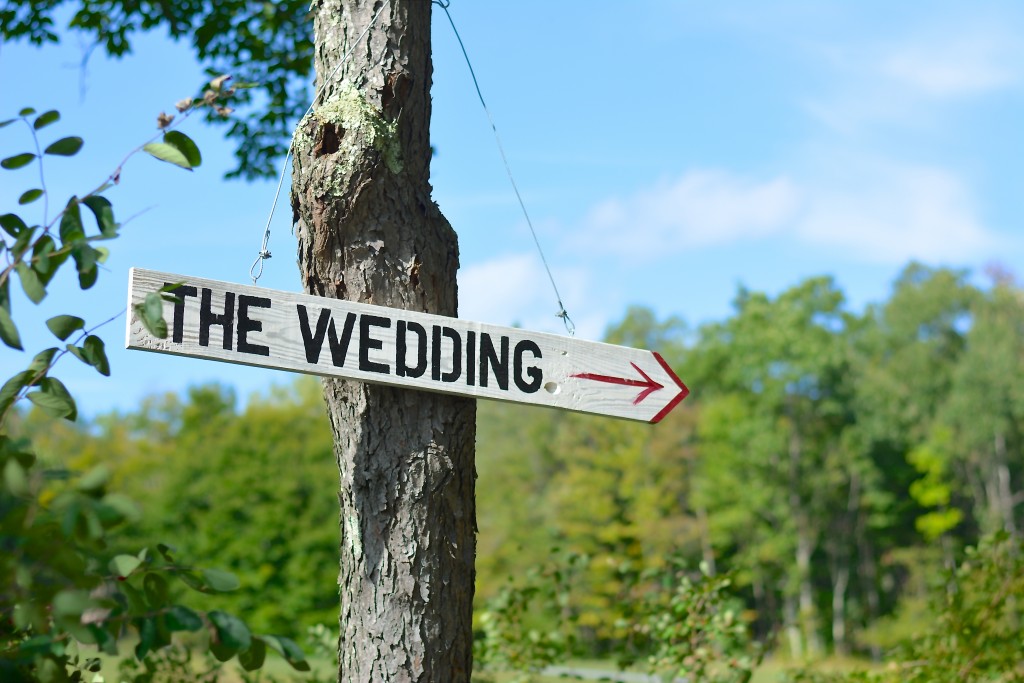 Signs such as this one lead the way to the wooded ceremony site...