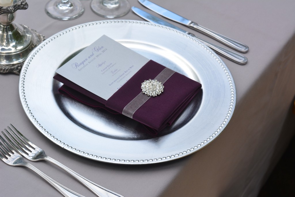 Each place setting was adorned with a crystal brooch...